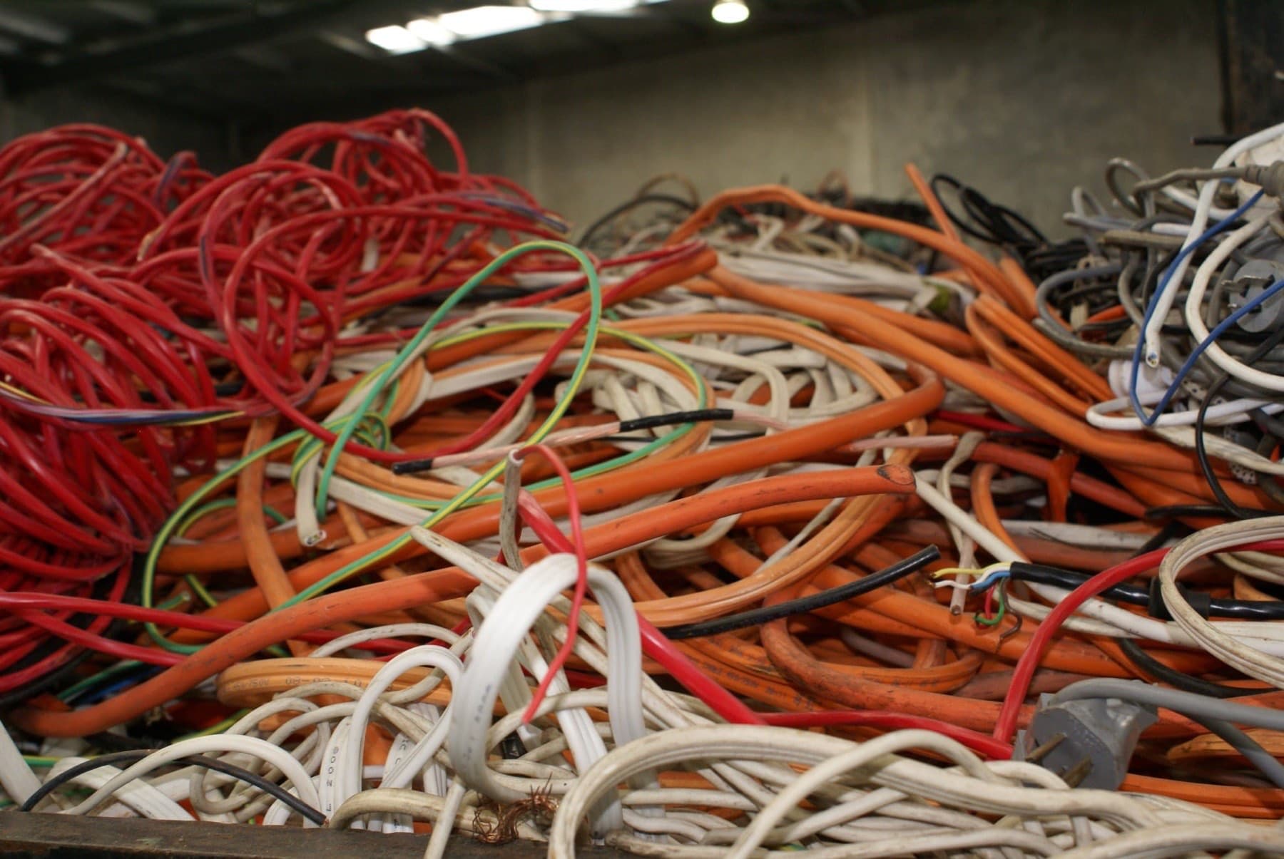 Sorted pile of insulated electrical cable ready for granulation
