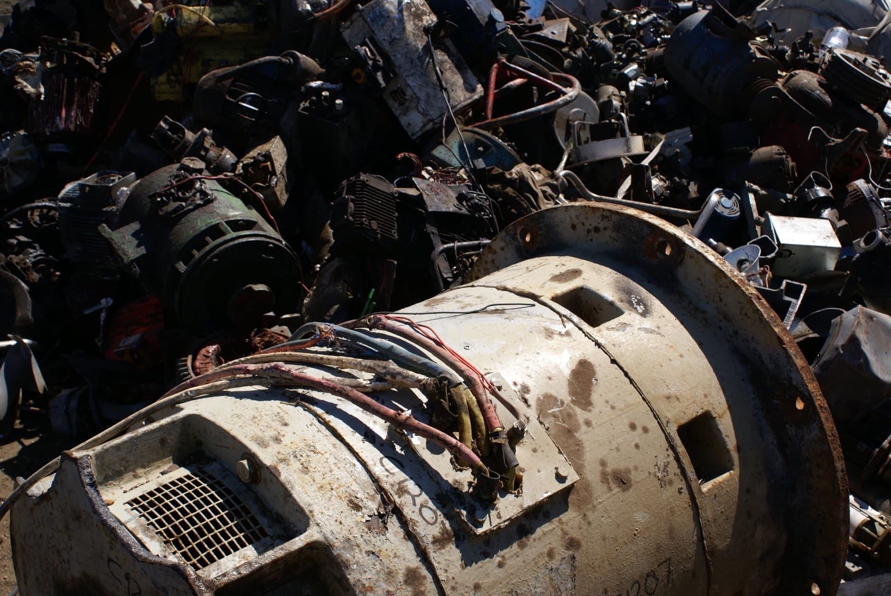 Stockpile of scrap electric motors awaiting recycling