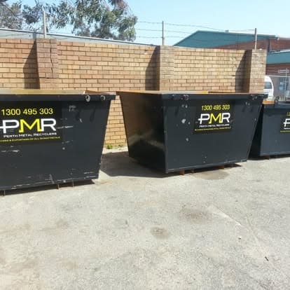Perth Metal Recyclers branded skip bins lined up ready for delivery